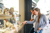 Couple looking in the window of a jewellery retailer on the high street